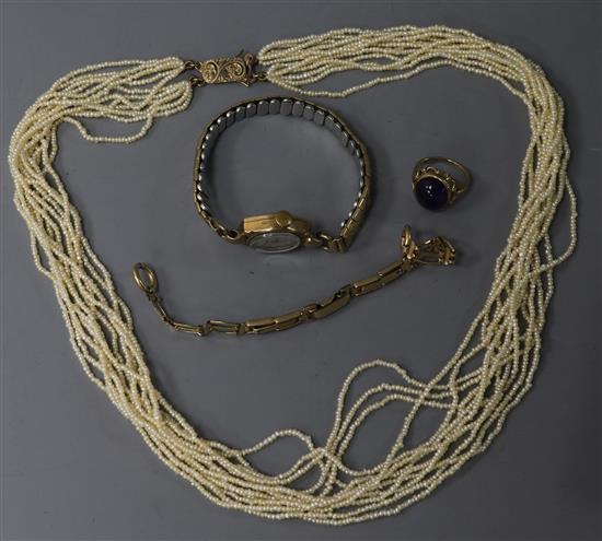A seed pearl necklace , a 9ct gold watch, a 9ct gold and cabochon amethyst ring and a rolled gold bracelet.